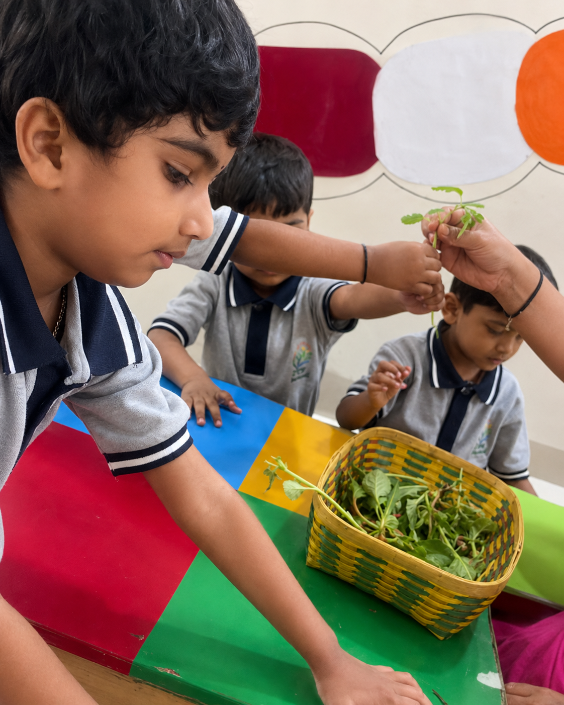 Arka children exploring plants together